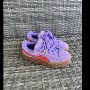 Purple and Red pumas